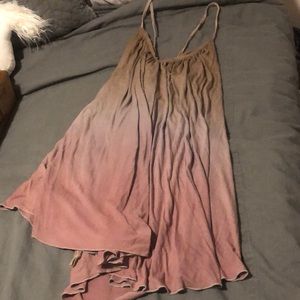 Long top/dress. Adjustable tie straps.